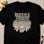 Black t-shirt printed DEATH BY A THOUSAND CUDDLES above a horde of red-eyed fanged bunnies