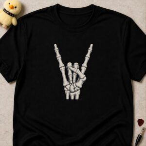 Black t-shirt printed with a skeleton hand throwing the devil horns in white line art