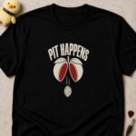 Black t-shirt printed PIT HAPPENS above a peach splitting open and dropping its stone