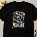 Black t-shirt printed METAL FAN below an electric desk fan crackling with lightning