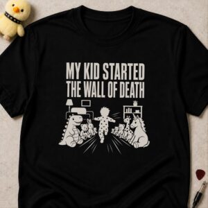 Black t-shirt printed MY KID STARTED THE WALL OF DEATH above a toddler charging between two rows of soft toys