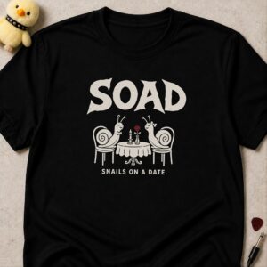 Black t-shirt printed SNAILS ON A DATE below two snails at a candlelit dinner table with a rose