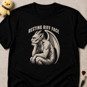 Black t-shirt printed RESTING RIFF FACE above a scowling gargoyle sitting with earphones in