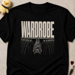 Black t-shirt printed WARDROBE above a bat hanging upside down from a rail of identical black clothes