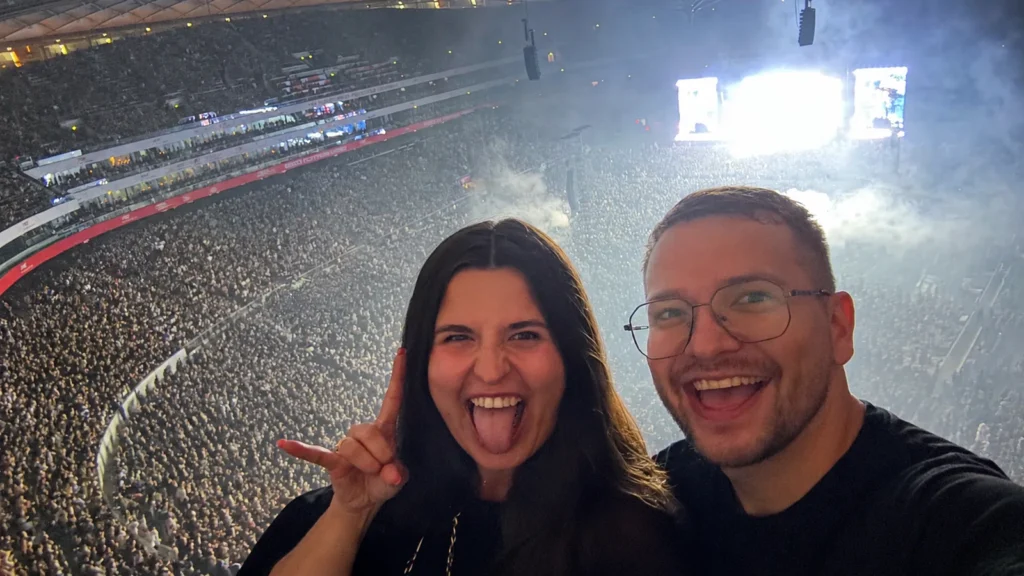 Pavel and Gabriele at the System of a Down show in Warsaw, July 2026, crowd of tens of thousands behind them