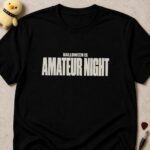 Black t-shirt printed HALLOWEEN IS AMATEUR NIGHT in bold condensed white lettering