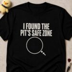 Black t-shirt printed I FOUND THE PIT'S SAFE ZONE above an empty circle with an arrow pointing to one dot on its edge