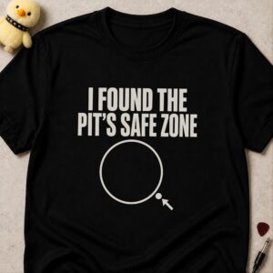 Black t-shirt printed I FOUND THE PIT'S SAFE ZONE above an empty circle with an arrow pointing to one dot on its edge