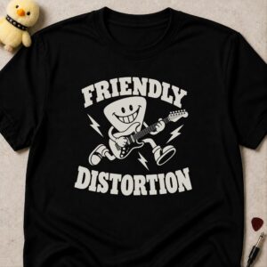 Black t-shirt printed FRIENDLY DISTORTION around a grinning guitar pick character playing an electric guitar