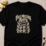 Black t-shirt printed FACE-MELTING RIFFS in cream metal lettering above a guitar speaker cabinet in flames